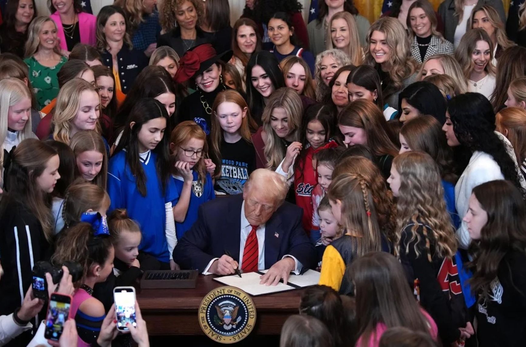 Trump signs an executive order banning female transgender athletes from competing in women's events